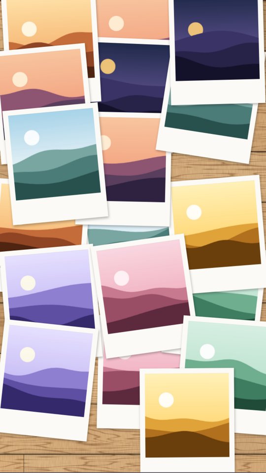 Polaroid prints scattered on a wooden table